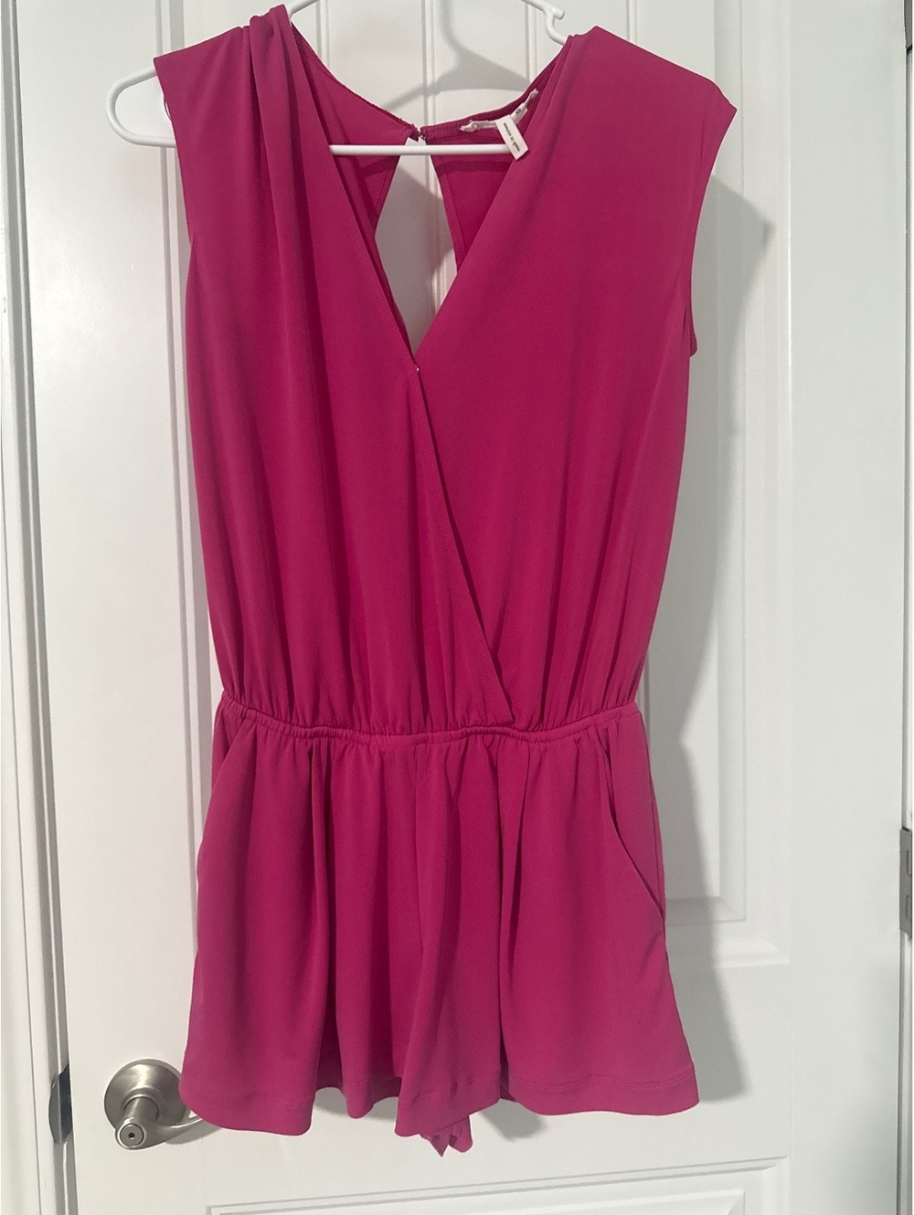 BCBGeneration Fuchsia Sleeveless Romper with V-Neck and Elastic Waist
